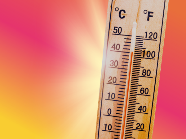 Abbildung eines Thermometers - im Hintergrund: Sonnenstrahlen, Quelle: canva.com/ Xurzon